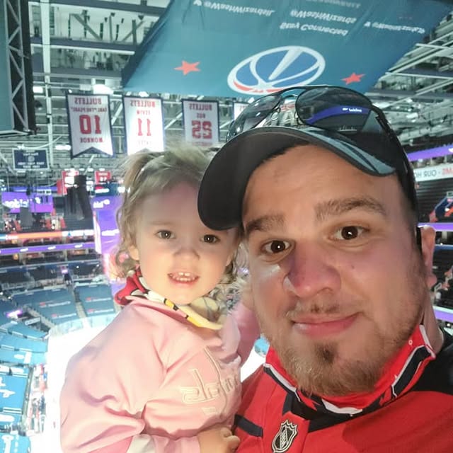 Dad and Graycie at hockey