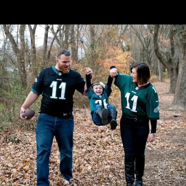 Family in Eagles jerseys