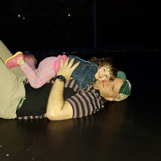 Dad and Jayleena on trampoline