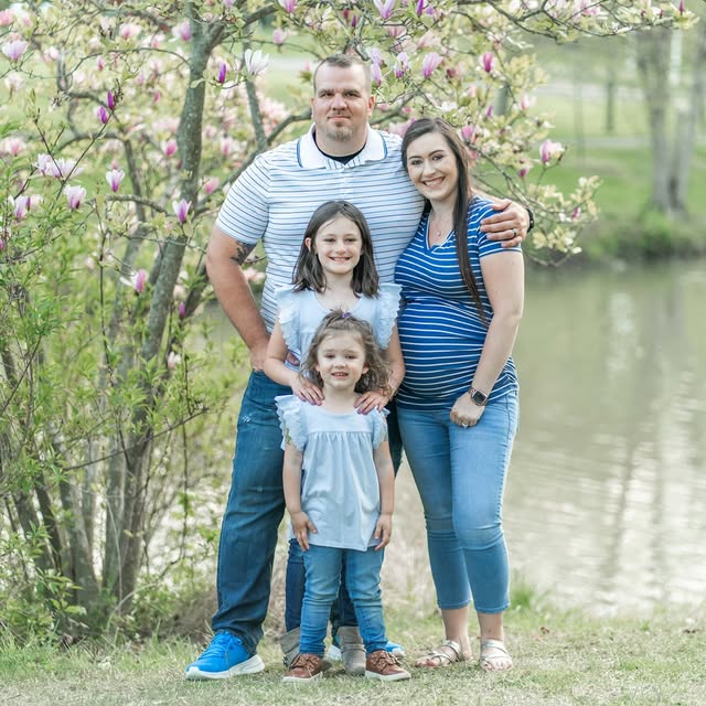 Family portrait by magnolia trees
